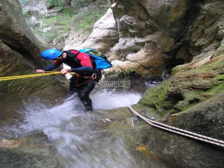 Abseiling down a waterfall Abseiling down a waterfall